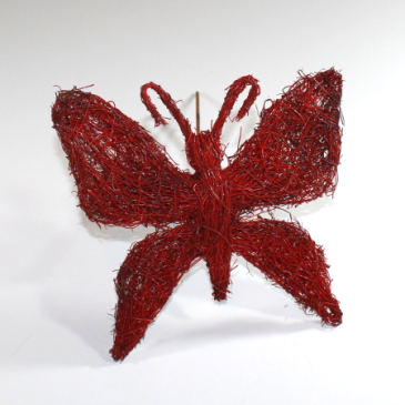 Rød sommerfugl på metalspyd